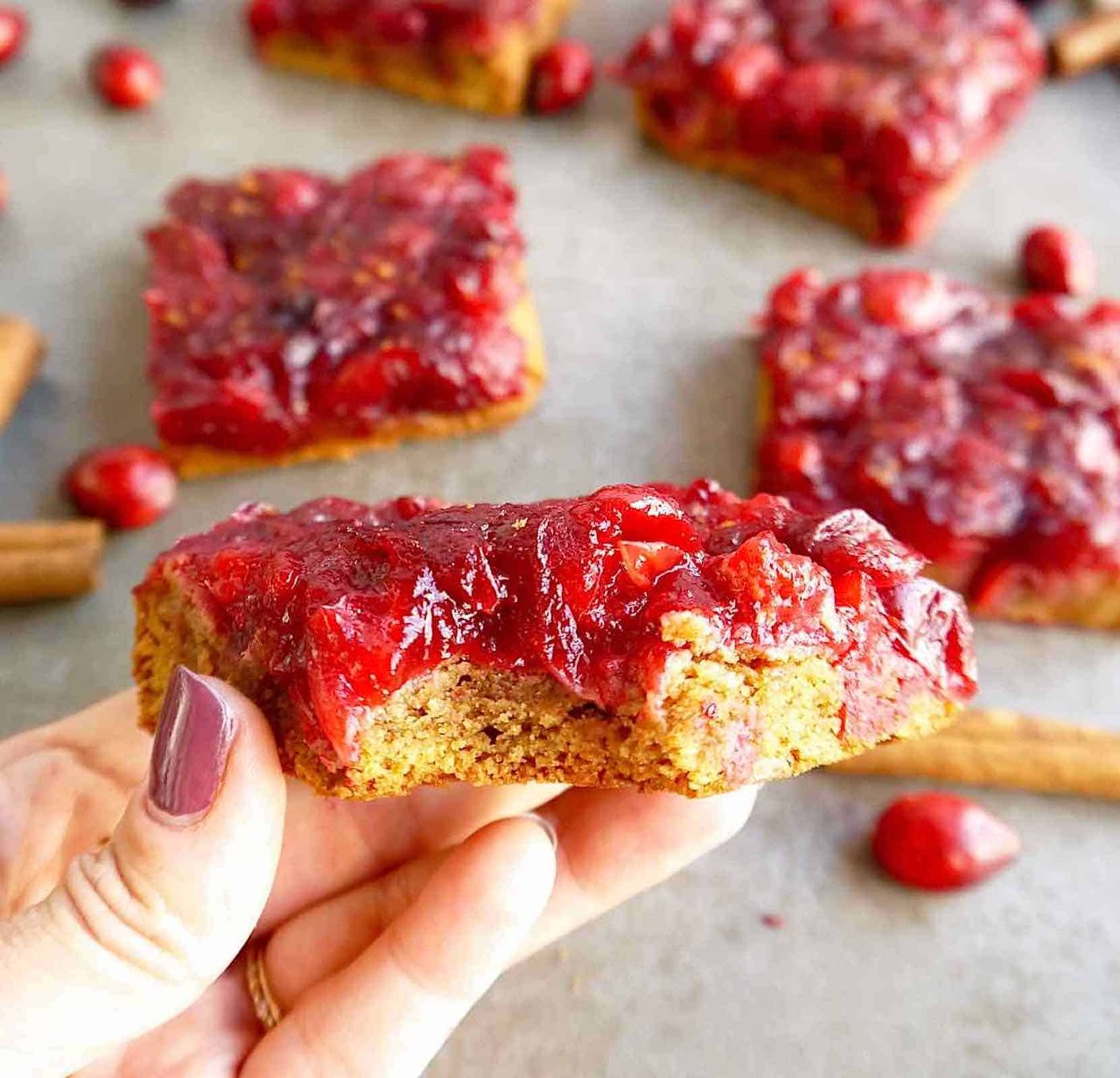 Paleo cranberry sauce bars cut into squares.