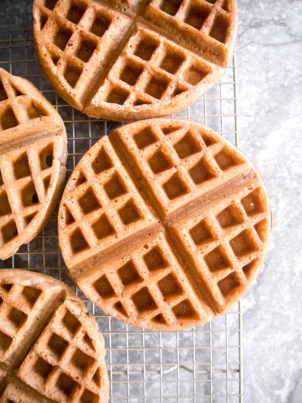 Paleo Dairy-free Belgian Waffles on a drying rack.