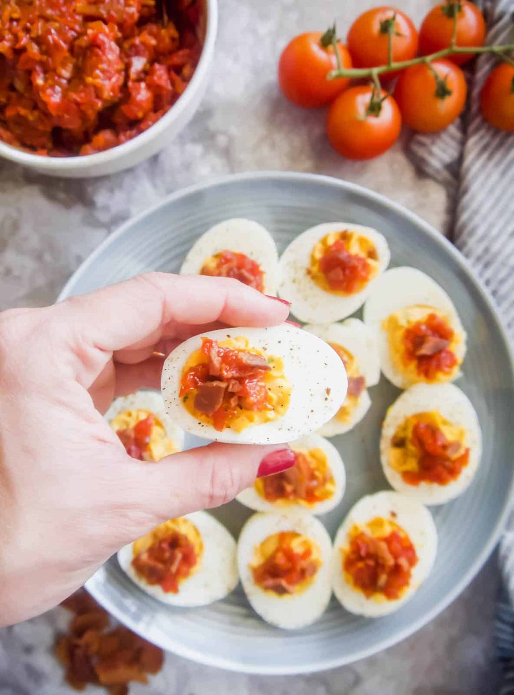 Paleo Deviled Eggs topped with Tomato Bacon Jam (GF)