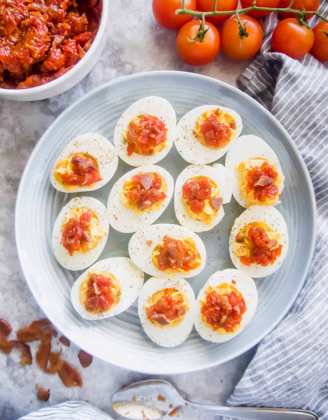 Paleo Deviled Eggs topped with Tomato Bacon Jam (GF)