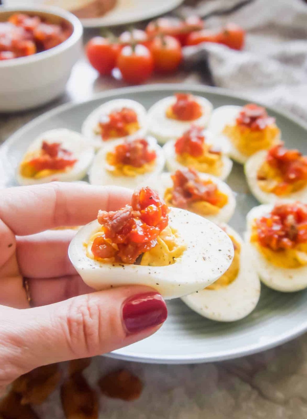 Tomato Bacon Jam: Paleo Deviled Eggs topped