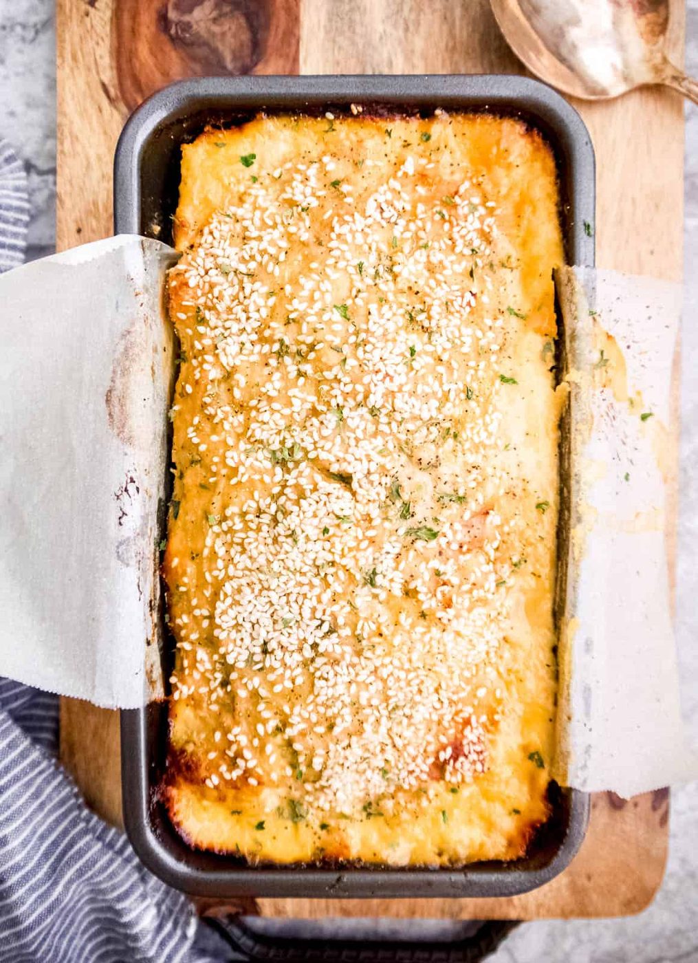 Paleo turkey meatloaf with honey sesame seasoning in a pan.