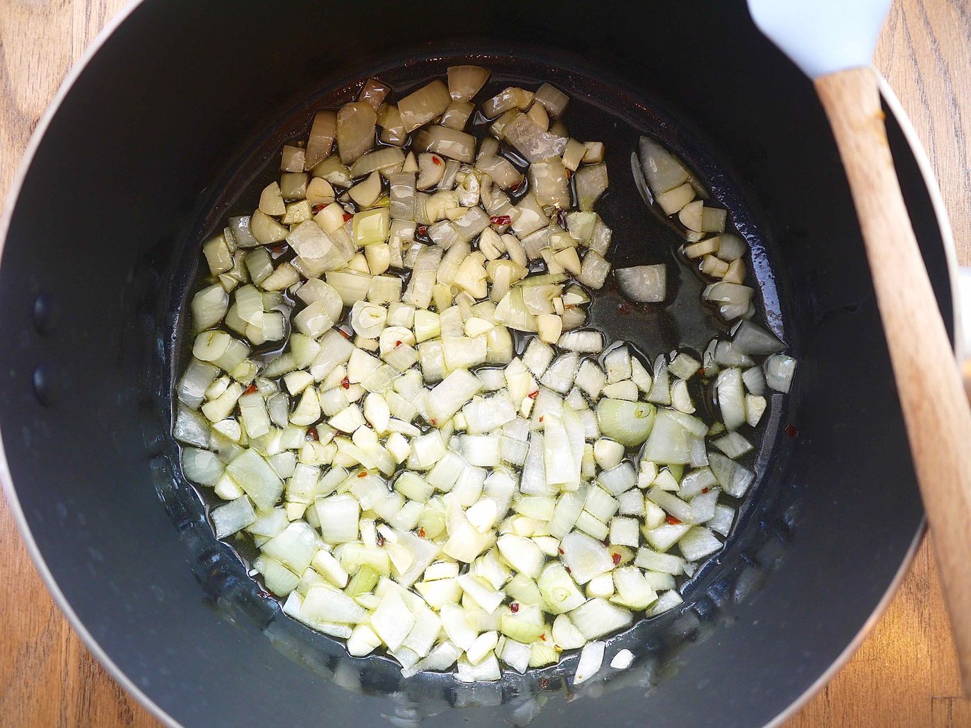 Onions and garlic in a pan.