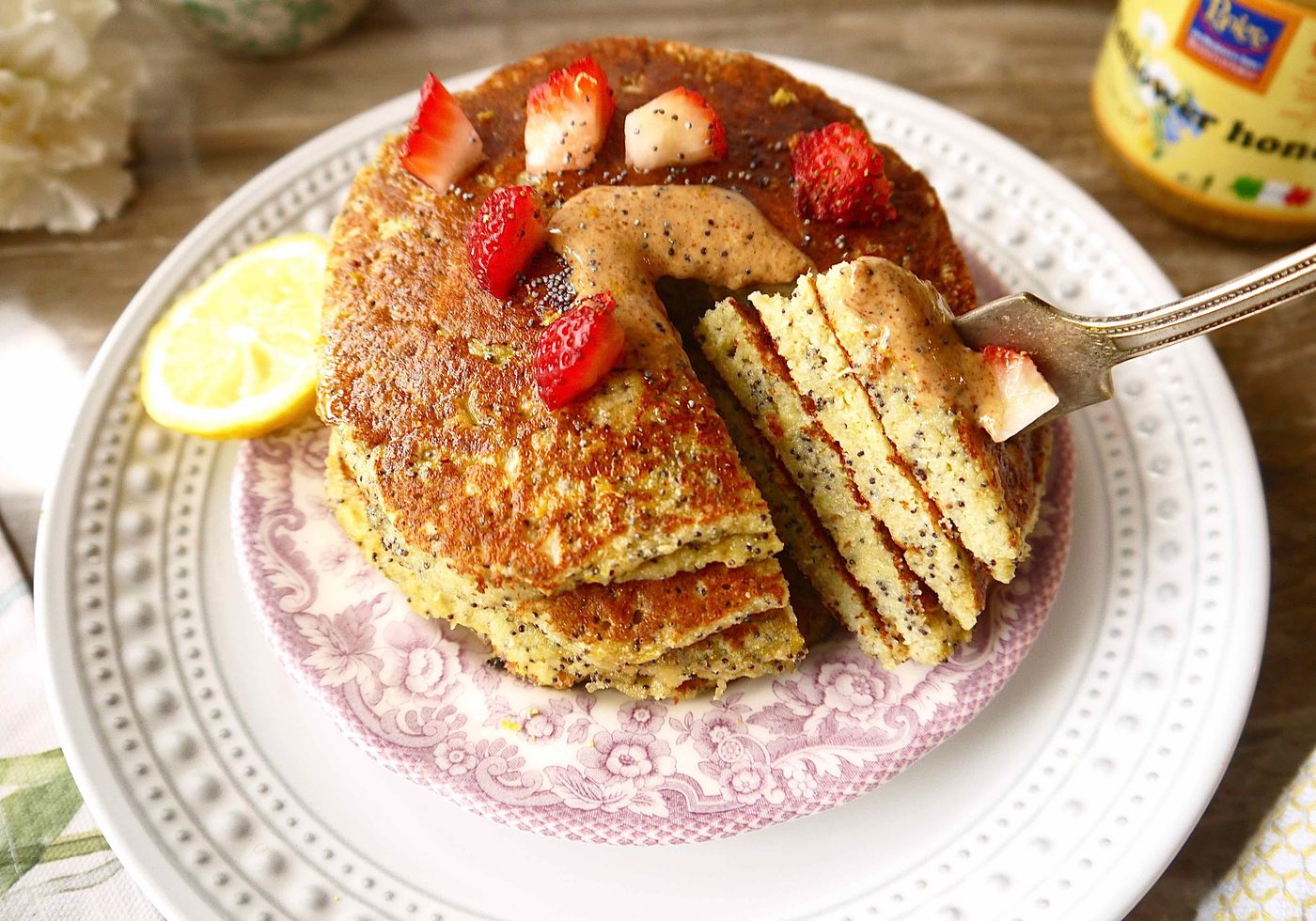 Paleo pancakes flavored with lemon and poppyseeds.