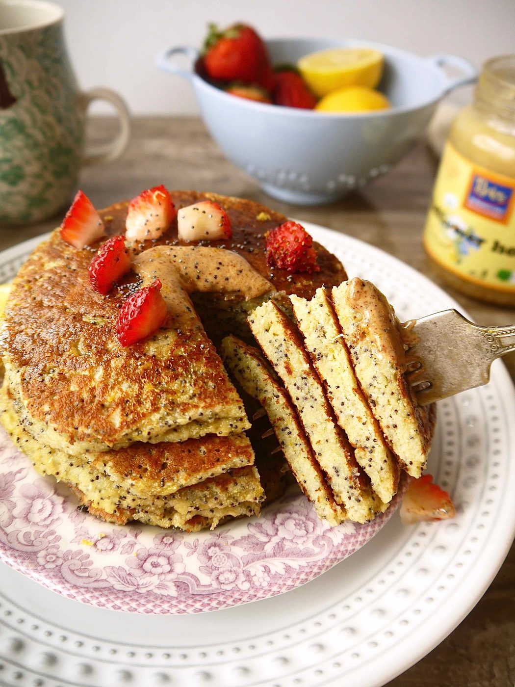 A fork in gluten free lemon poppyseed pancakes.