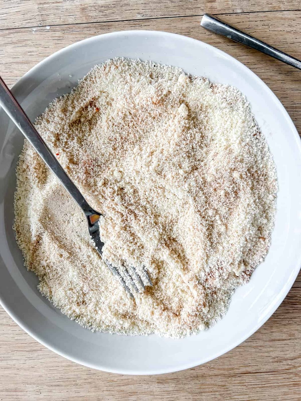 Almond flour breading mixture in a bowl.