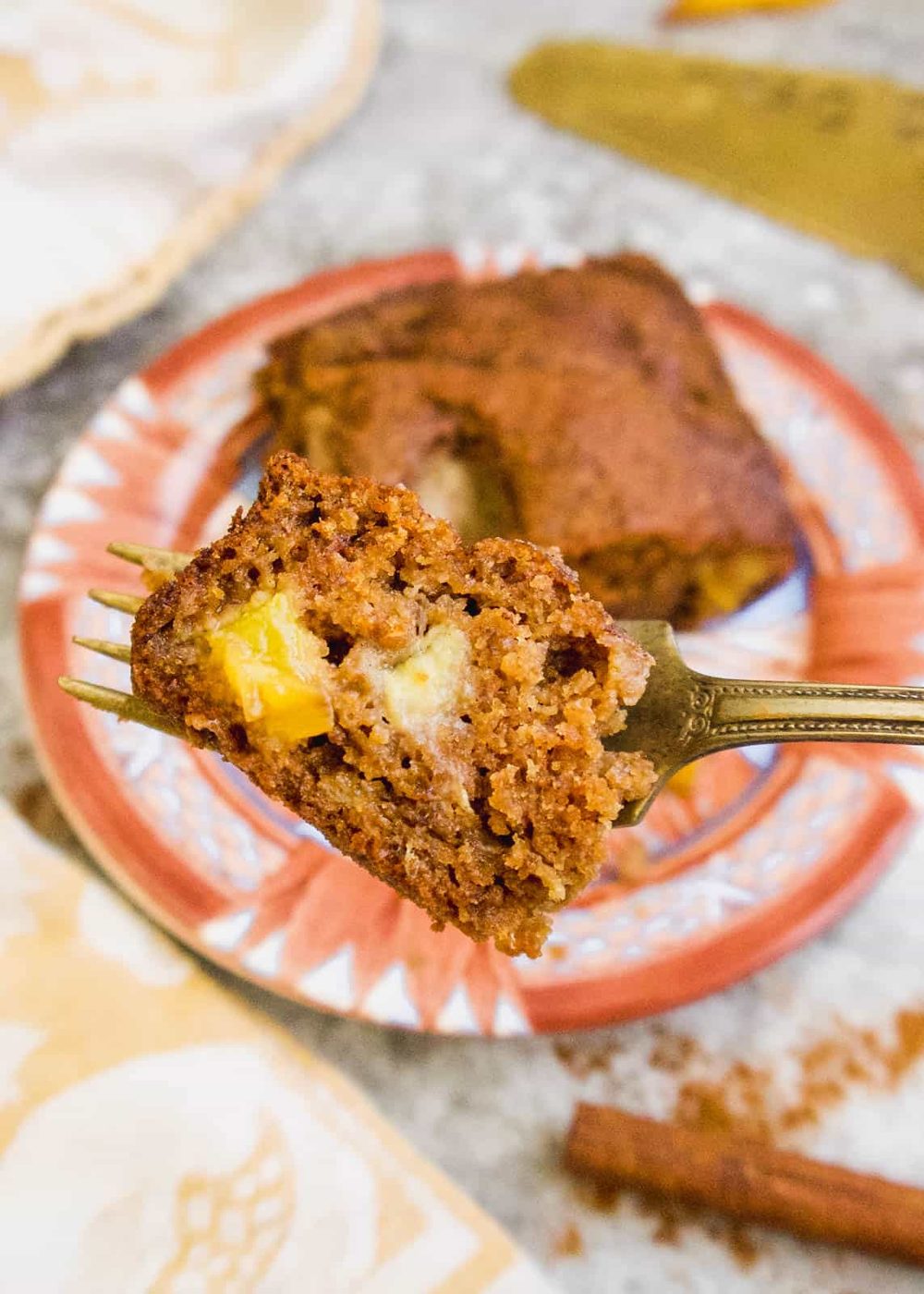 A piece of banana nectarine bread on a fork.