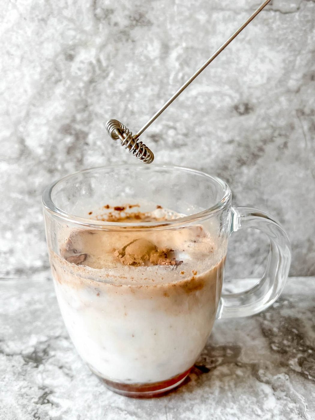 Getting ready to mix the pumpkin spice hot chocolate with a frother.
