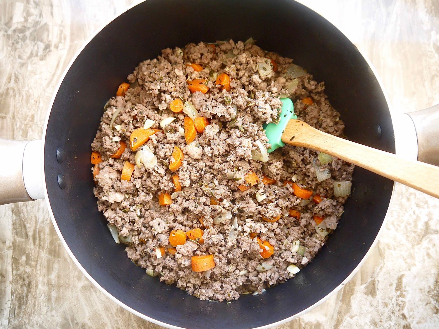 Browned meat in a large pot.