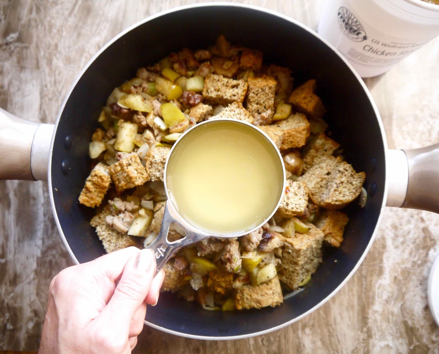Paleo stuffing with sausage being made in a pan.