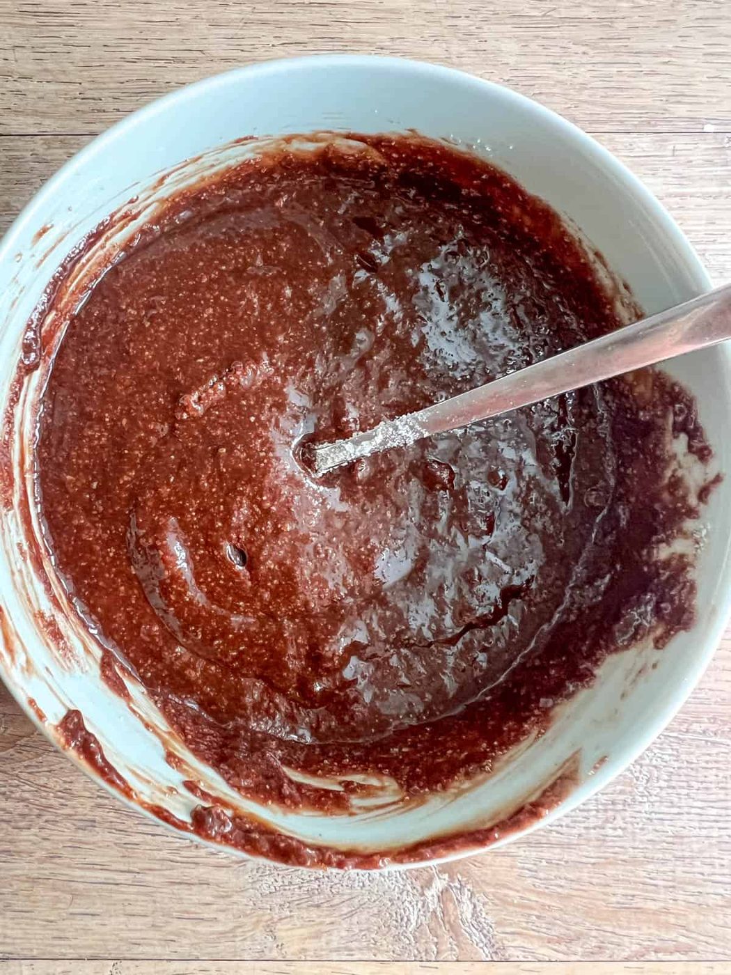 Almond flour brownie batter in a bowl.