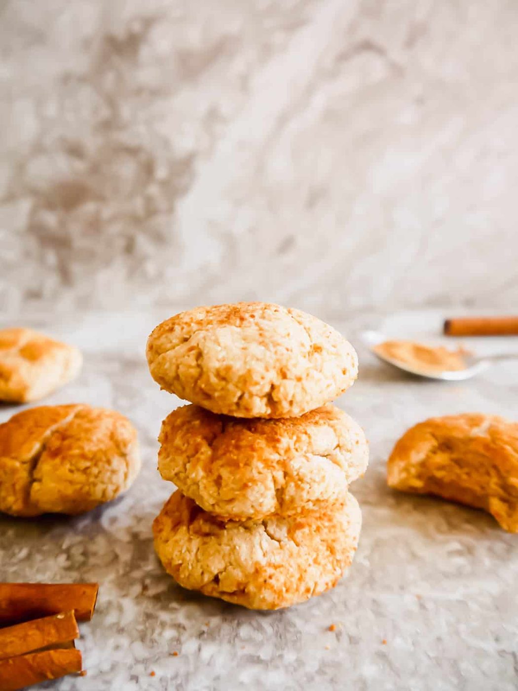 Grain-free snickerdoodles stacked on top of each other.