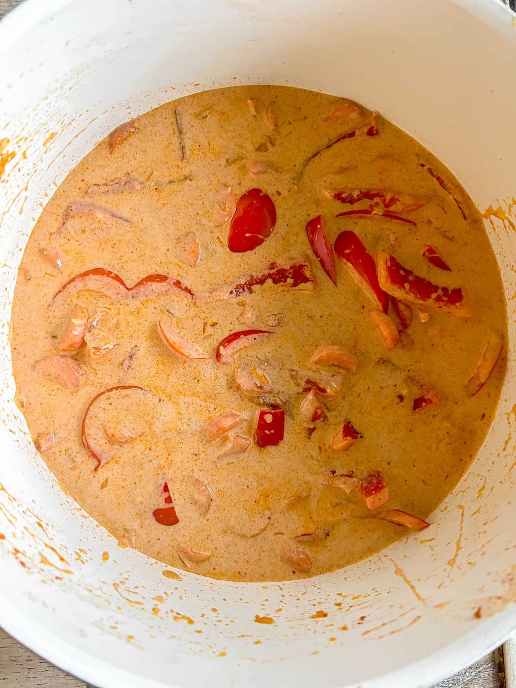 Coconut cream added to the pan.