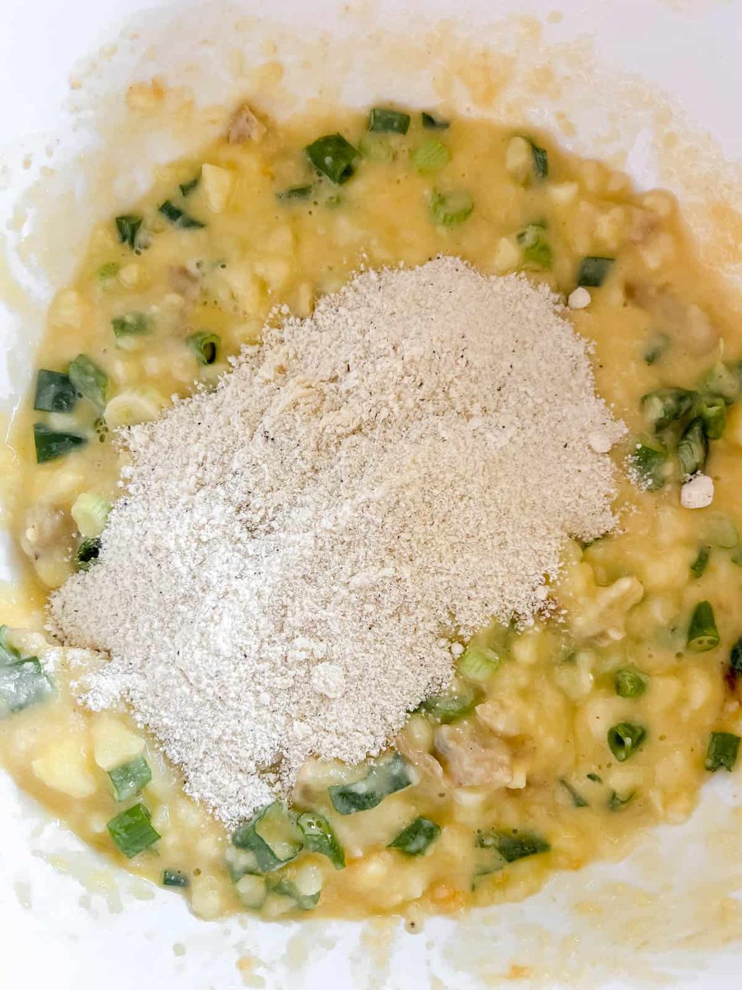 The flour mixture added to the mashed potato mixture.