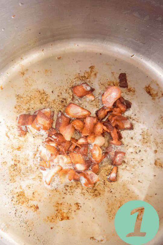 Bacon cooking in a pot.