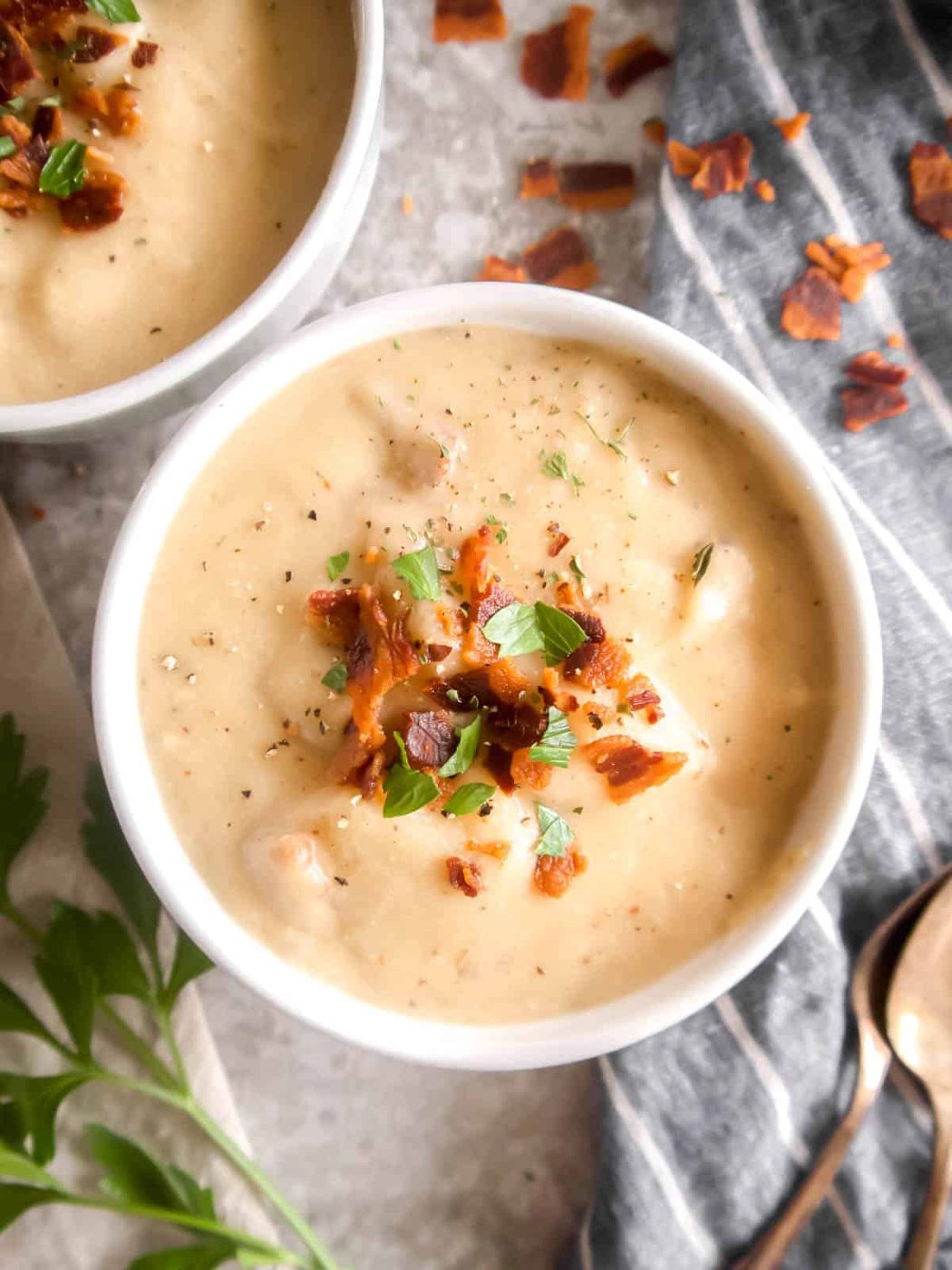 Potato soup poured into a bowl.
