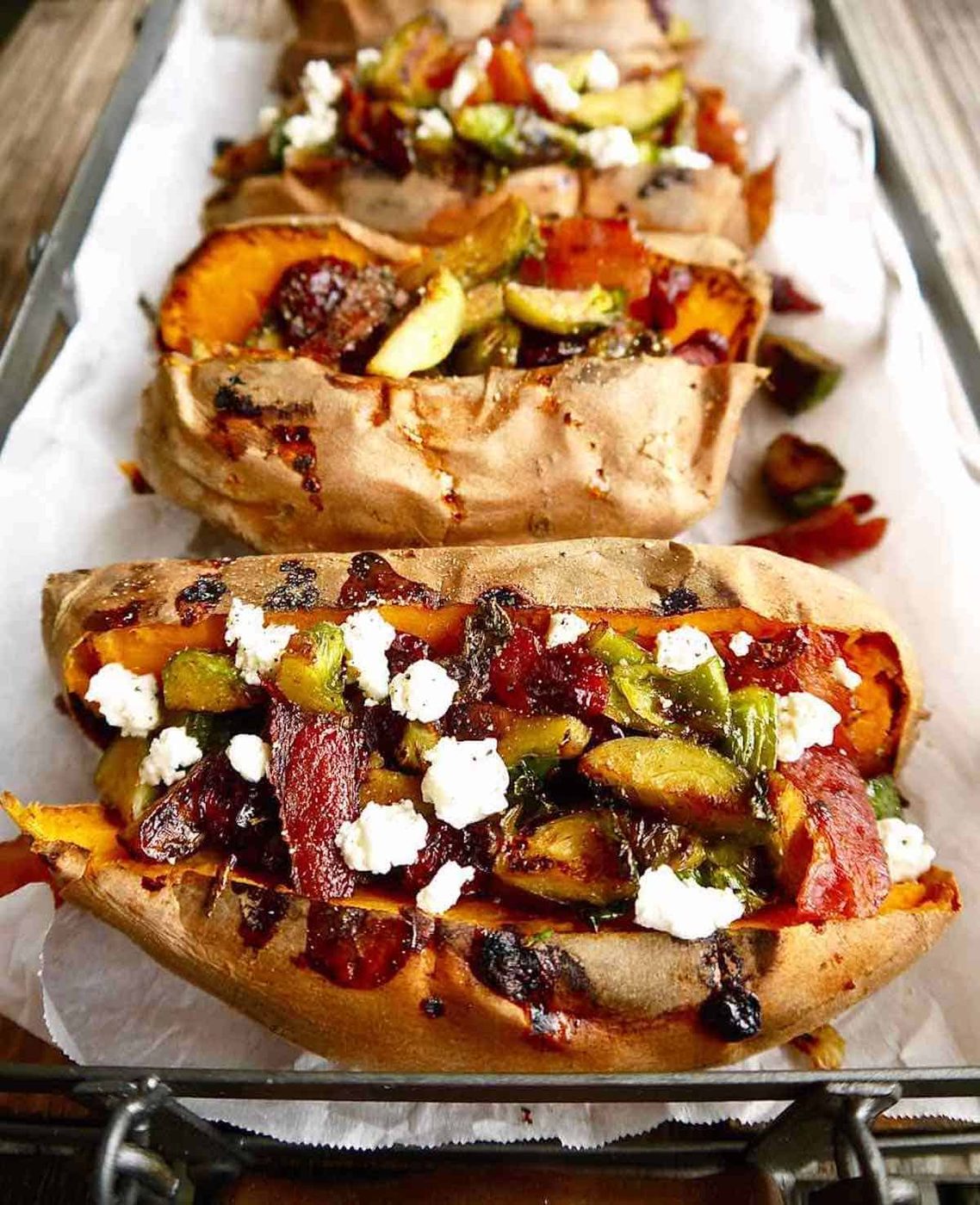Sweet potato brussel sprouts cranberries all in stuffed potato form.