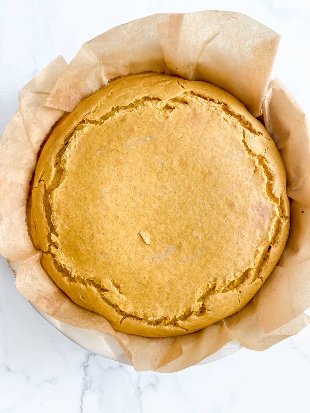 Pumpkin cheesecake pie after baking.