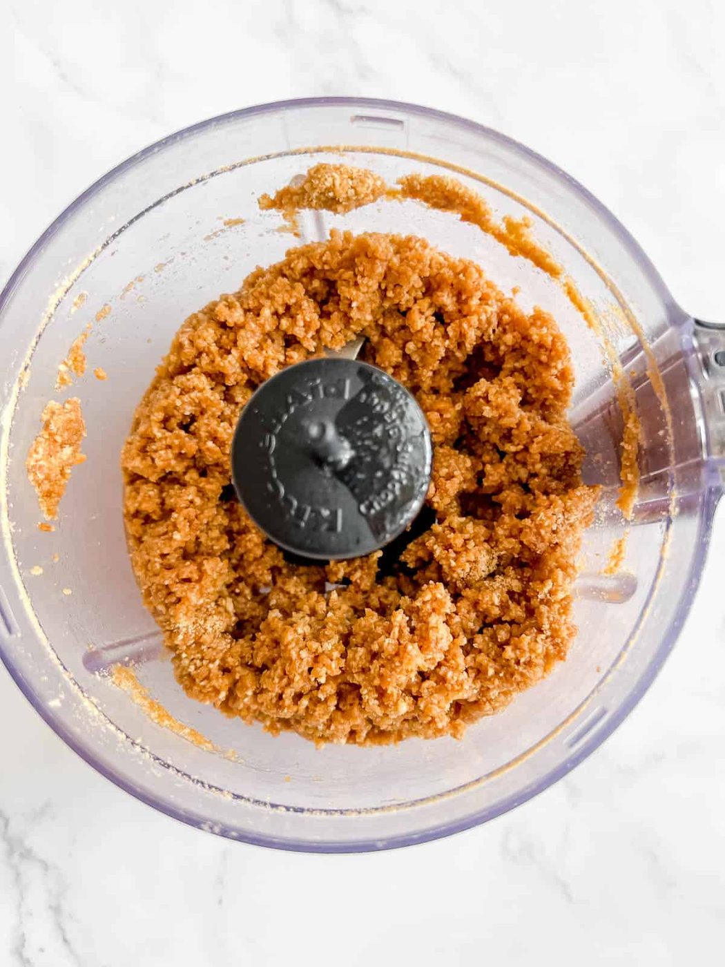 Cheesecake crust in a food processor.