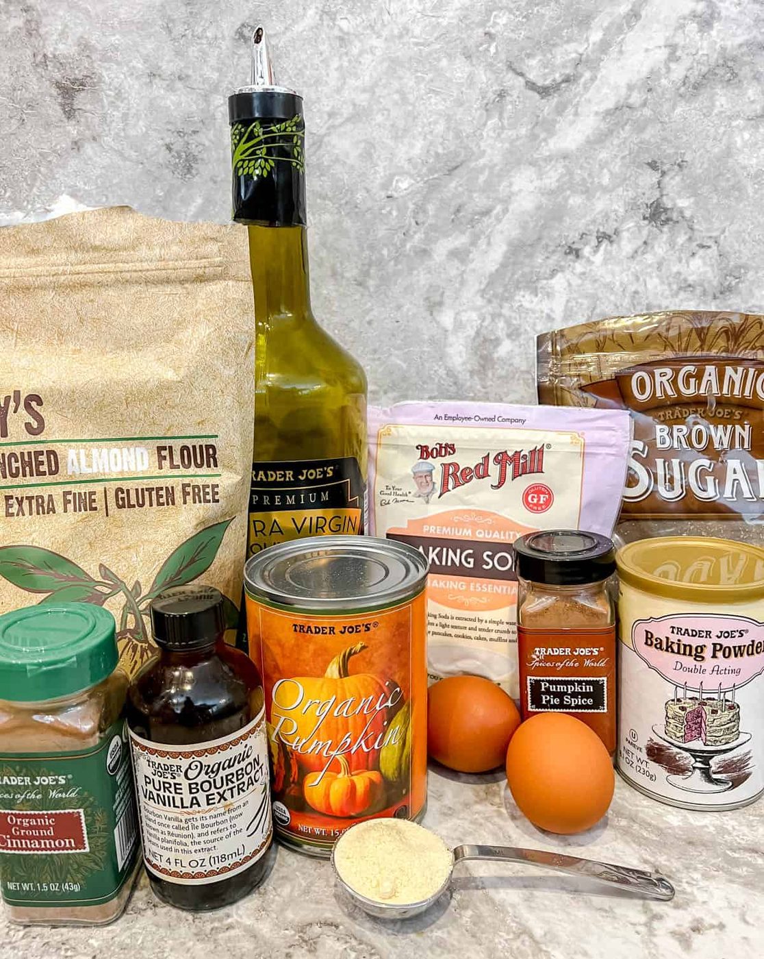 Ingredients needed to make almond flour pumpkin cake with olive oil.