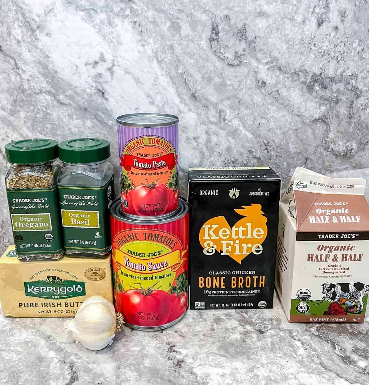 Recipe ingredients for creamy simple tomato soup.