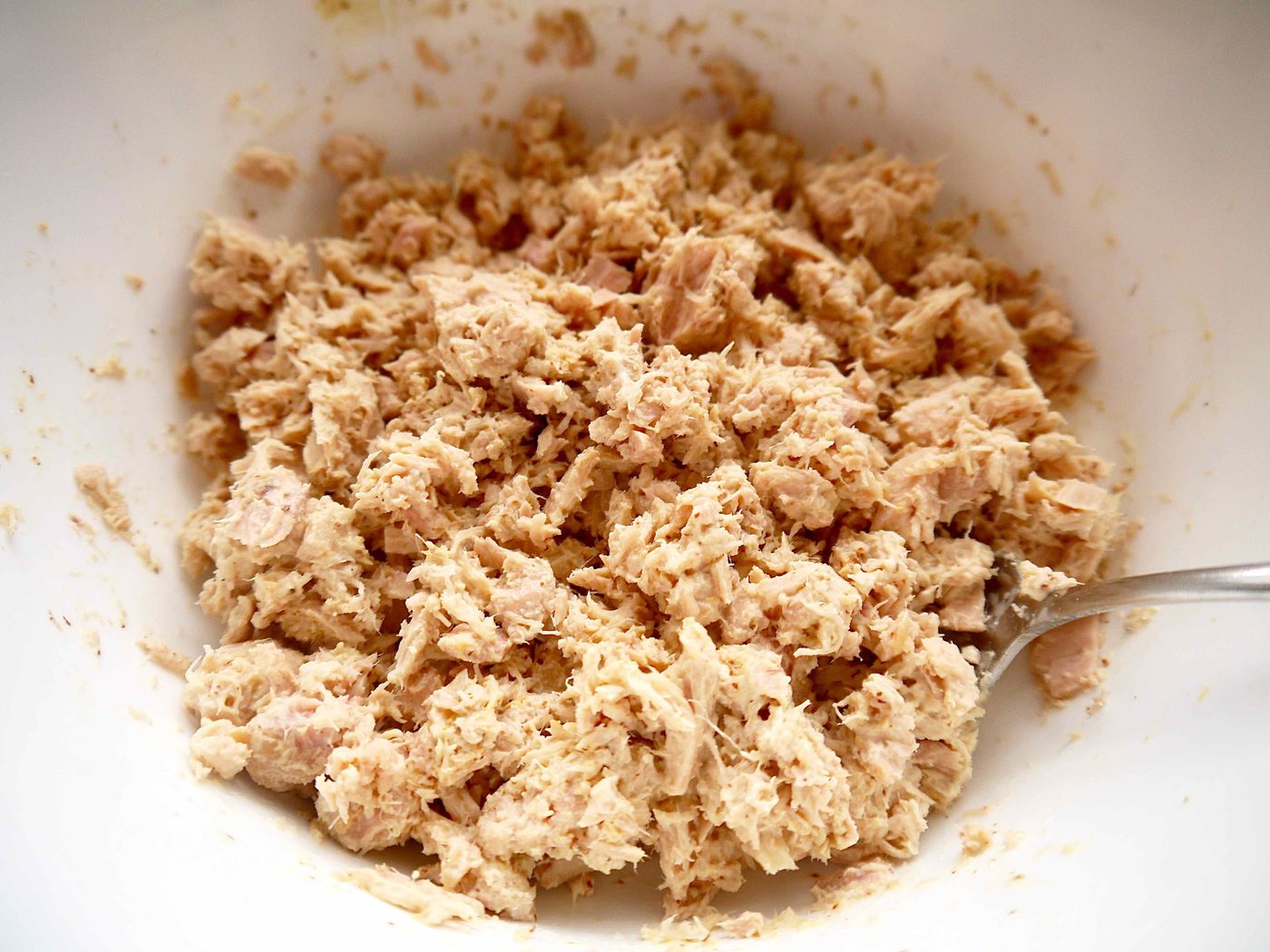 Tuna mixed into mayo and mustard.