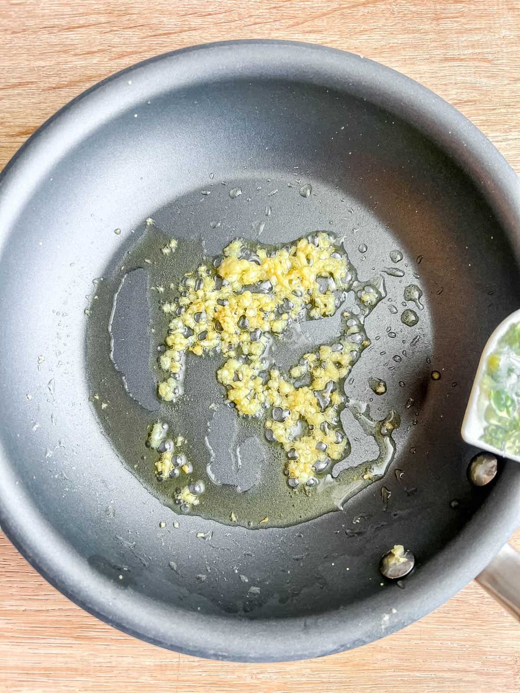 Garlic sautéing in olive oil.