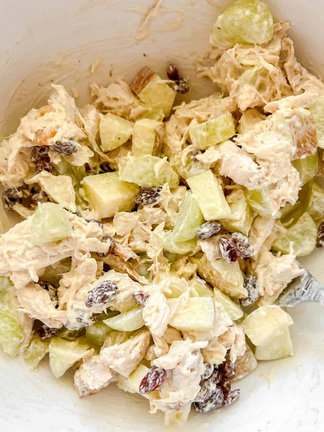 Apples, raisins and grapes added to chicken salad.