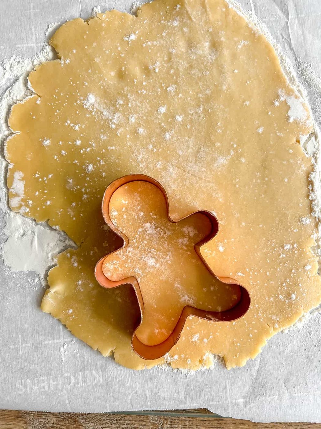 Rolling out the sable cookie recipe.