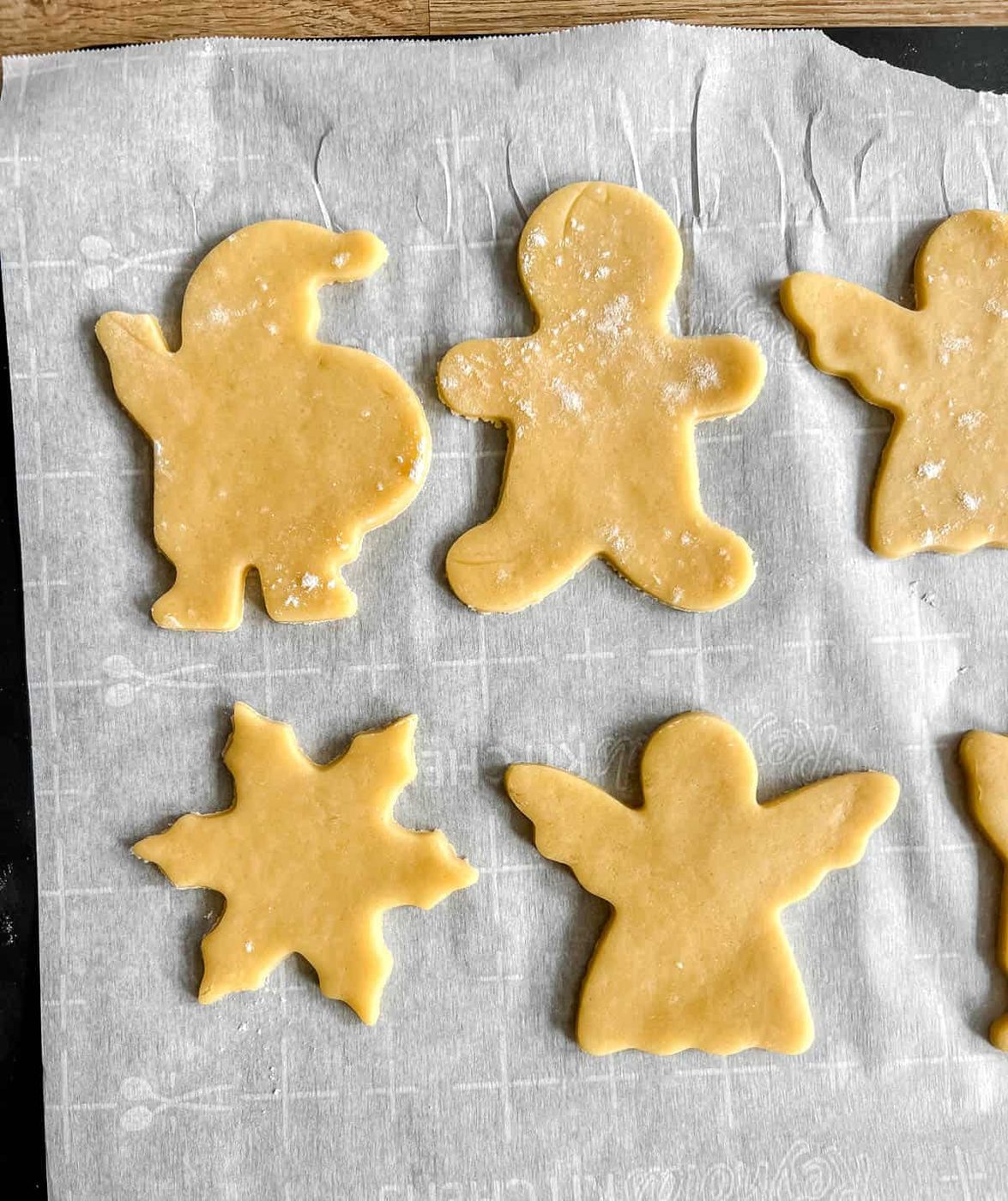 Sable cut out sugar cookies before baking.