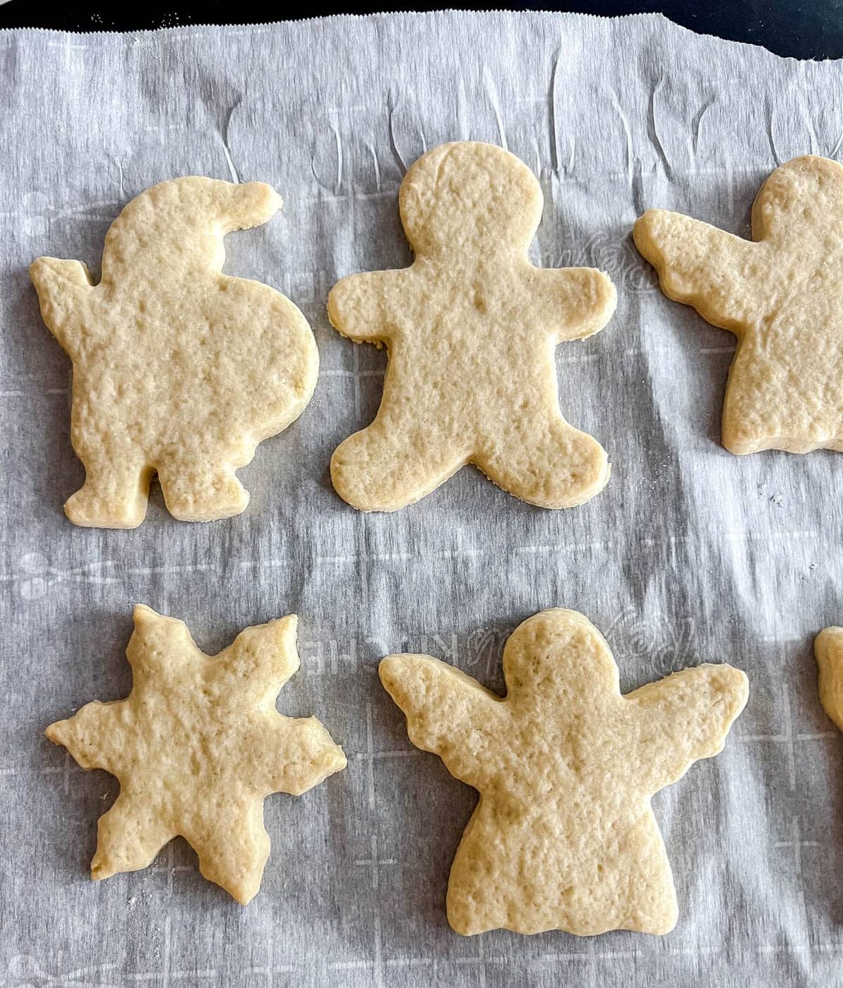 Sable cut out sugar cookies after baking.