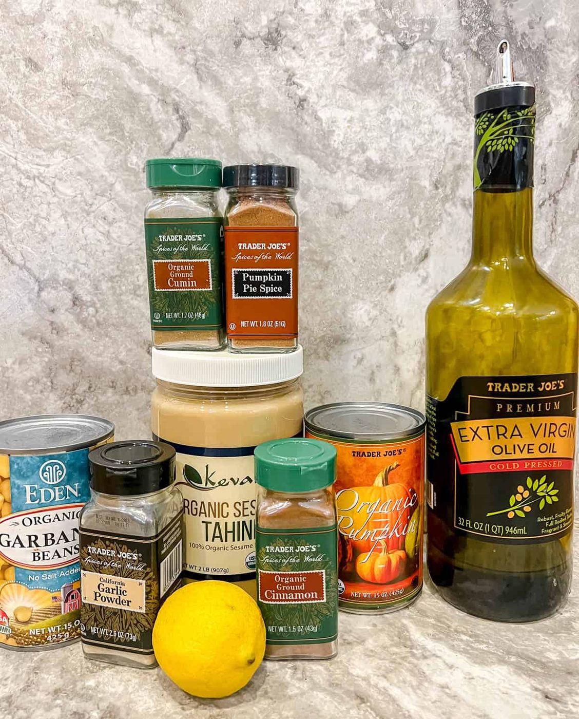 Ingredients needed to make pumpkin spice hummus.