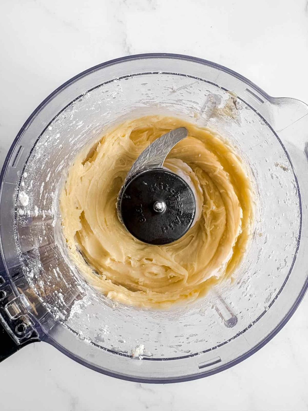 Frosting in a food processor.