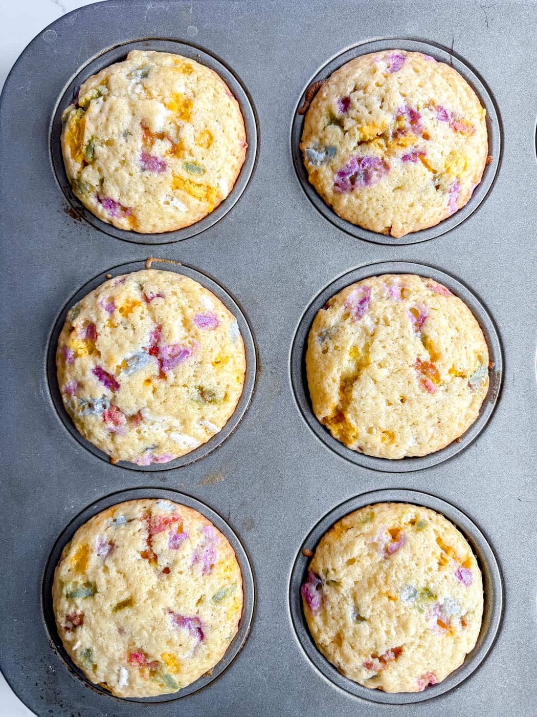 6 cupcakes freshly baked funfetti cupcakes.