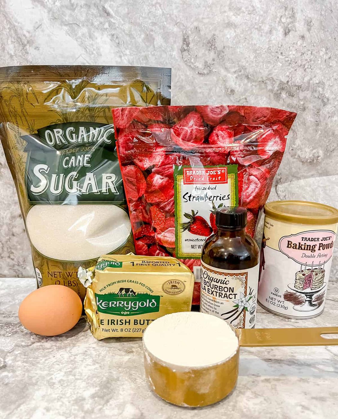 Ingredients needed to make strawberry cupcakes.