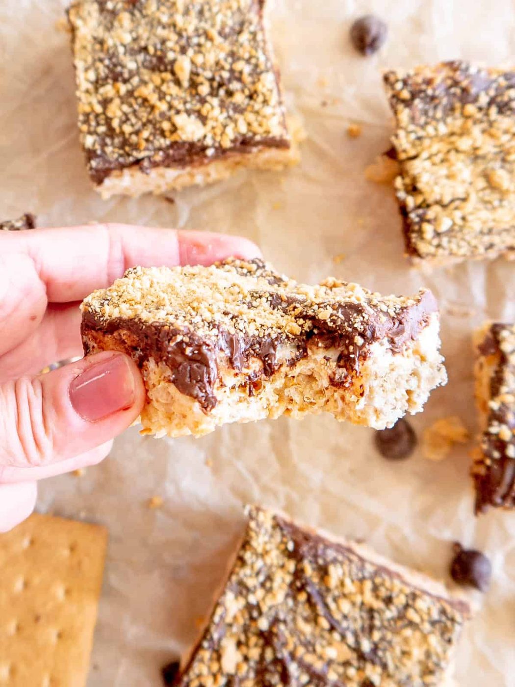 A bite taken out of a s'mores rice krispie treats.