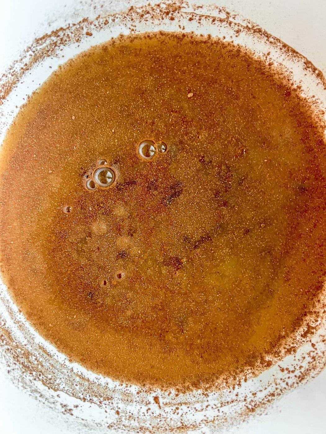 Orange juice and spices mixed together.