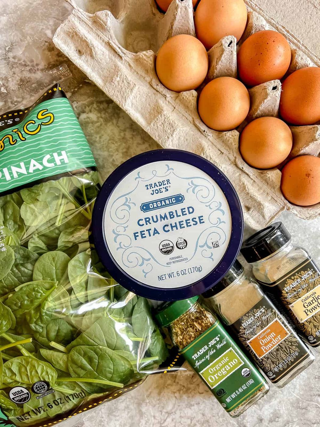 Ingredients needed to make Spinach feta egg cups.