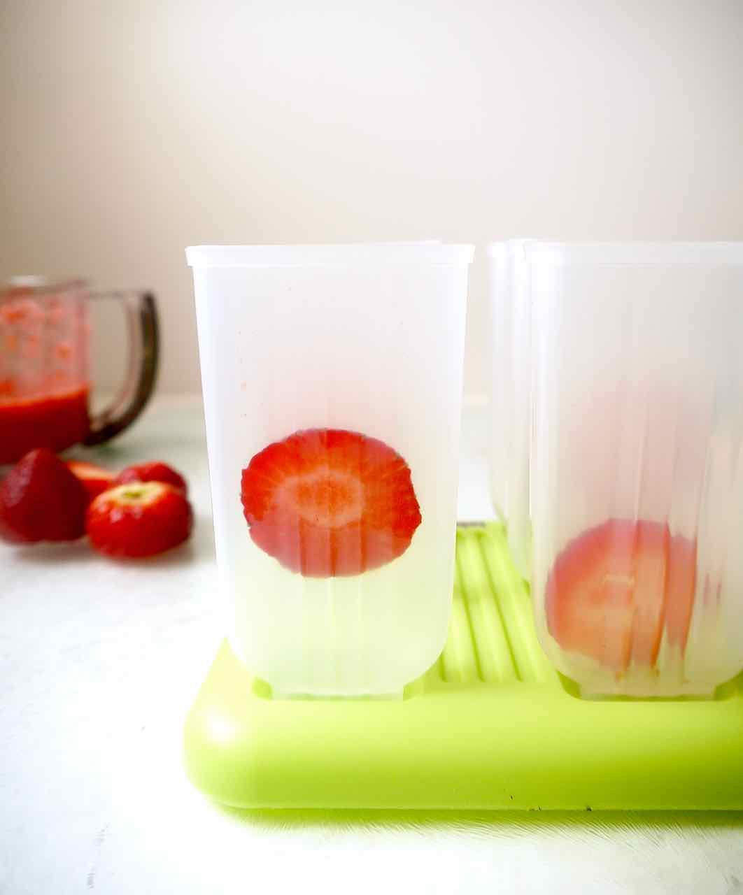 Strawberries in a Popsicle mold.