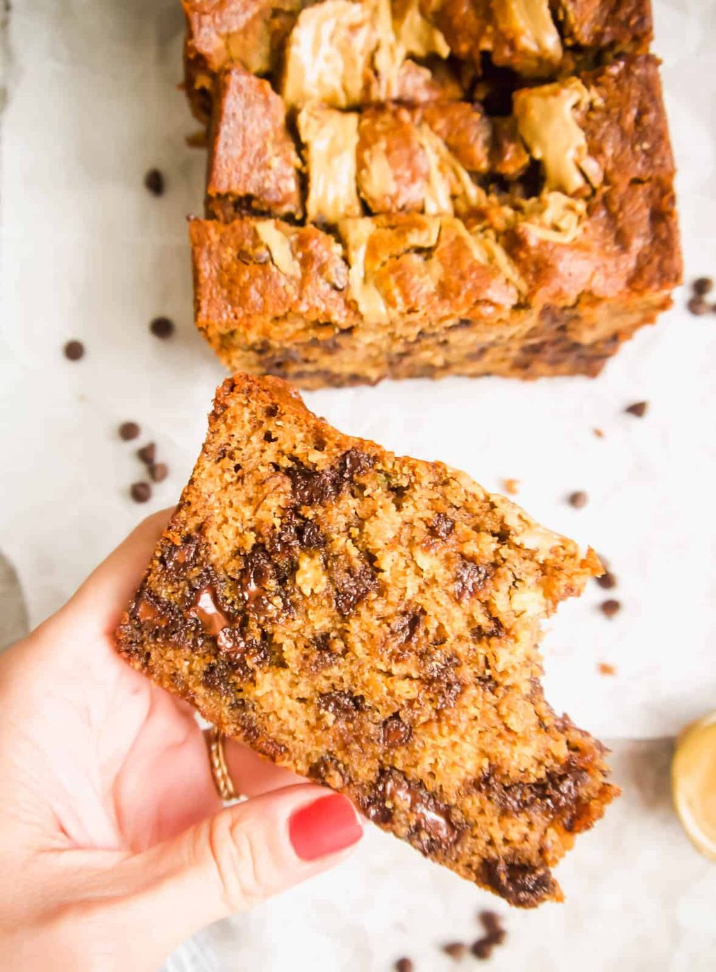 Sunflower Seed Butter and Chocolate Chip Banana Bread in ones hands.