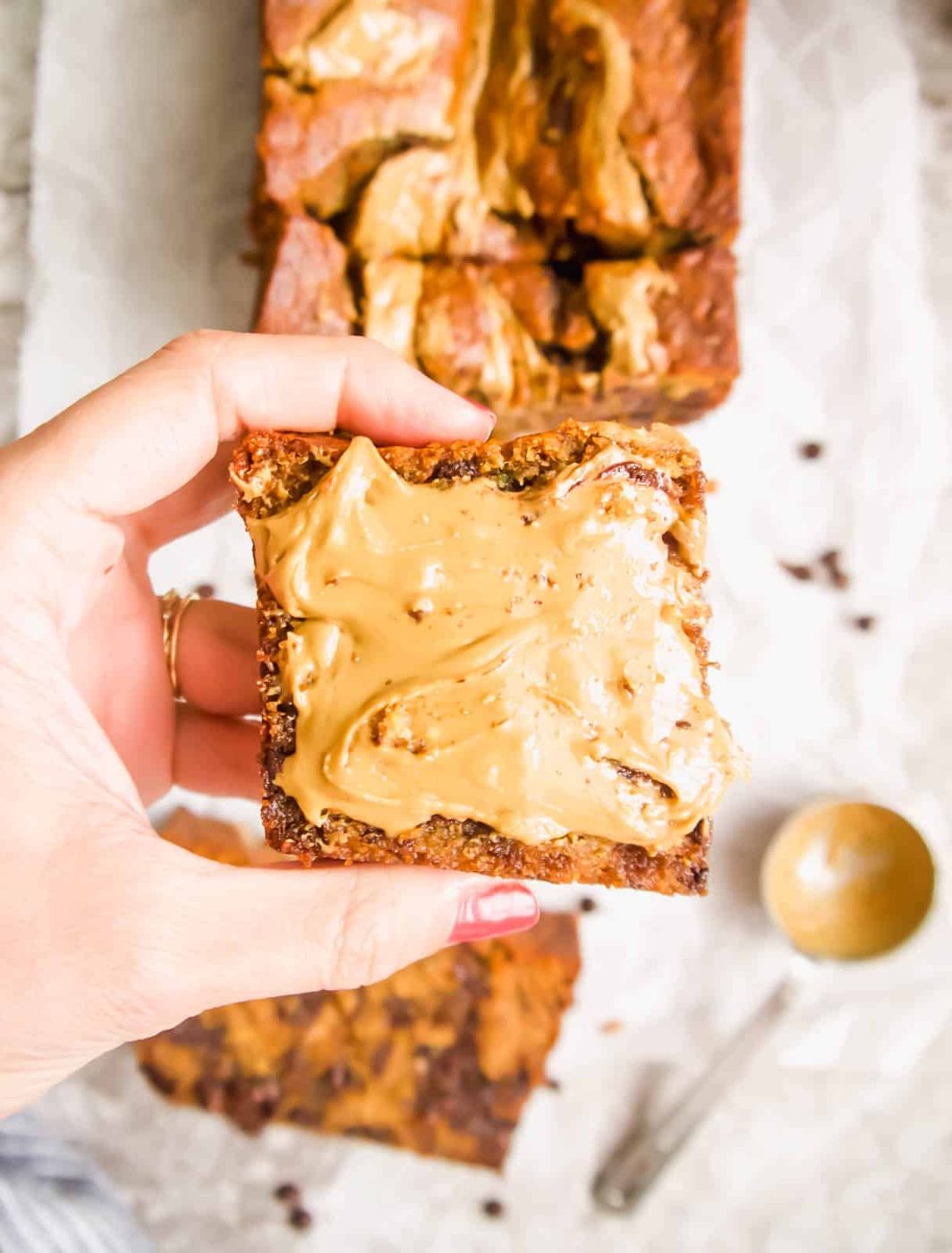 Sunflower butter on top of paleo banana bread.