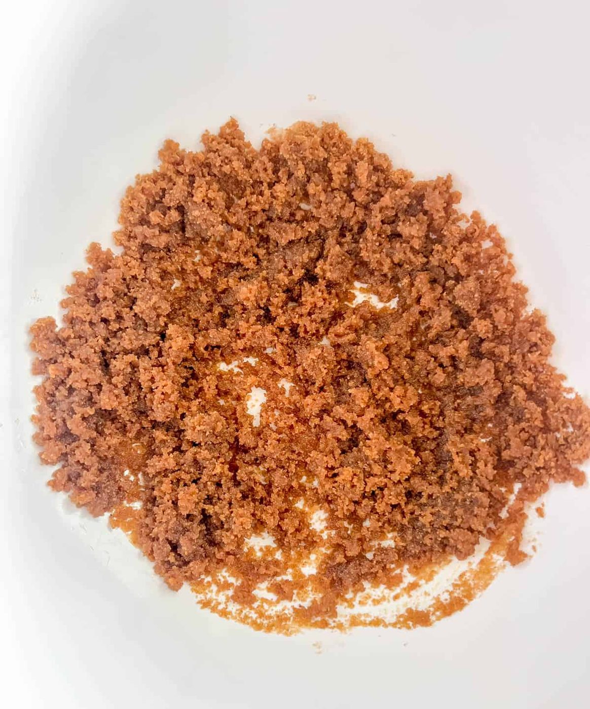Coconut sugar and oil in a bowl.