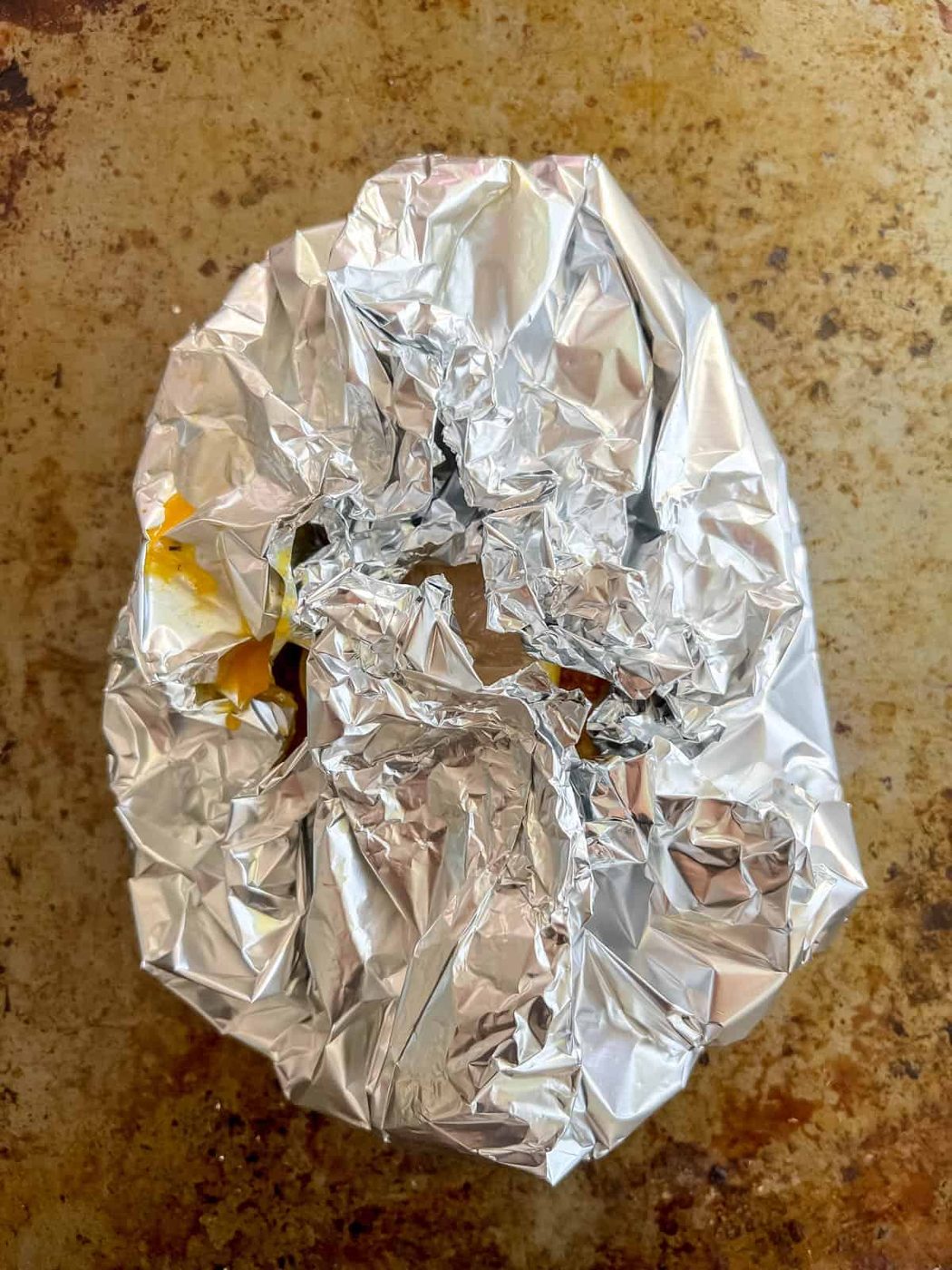 Salmon wrapped in foil.