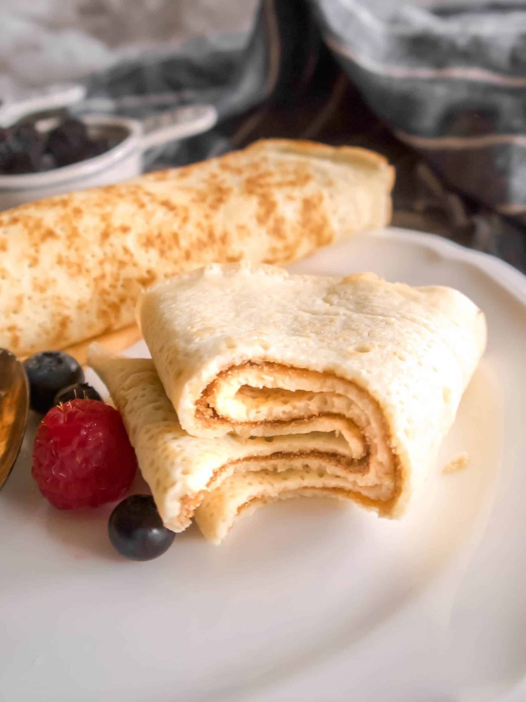 A bite taken out of a blender crepe.