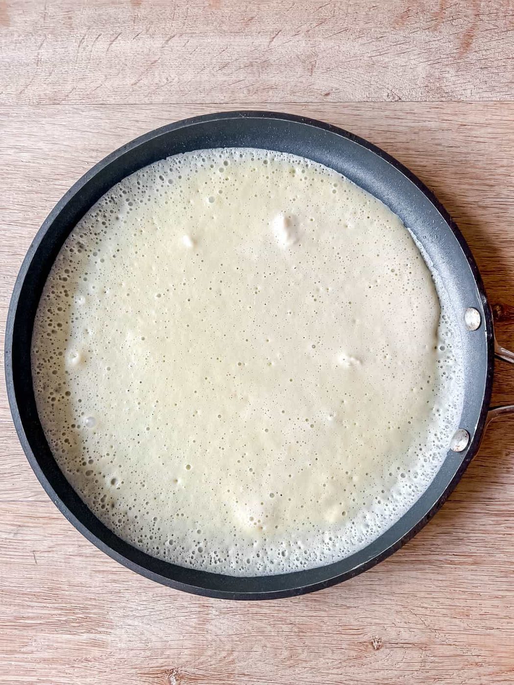 Batter poured into crepe pan.