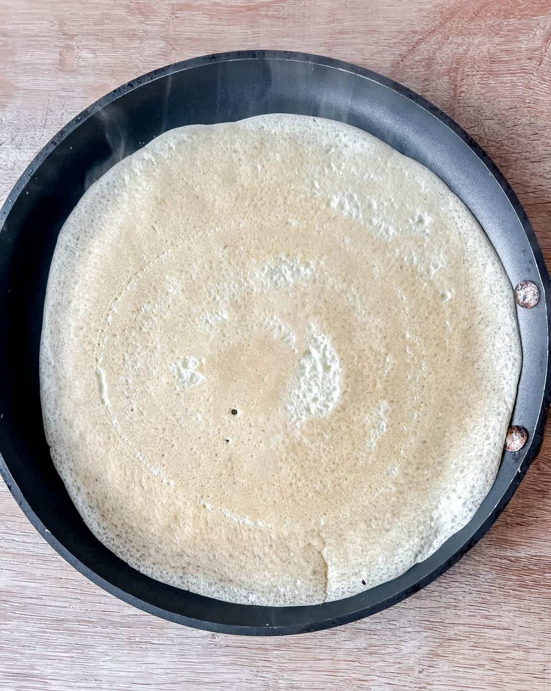 Crepe flipped to the other side.