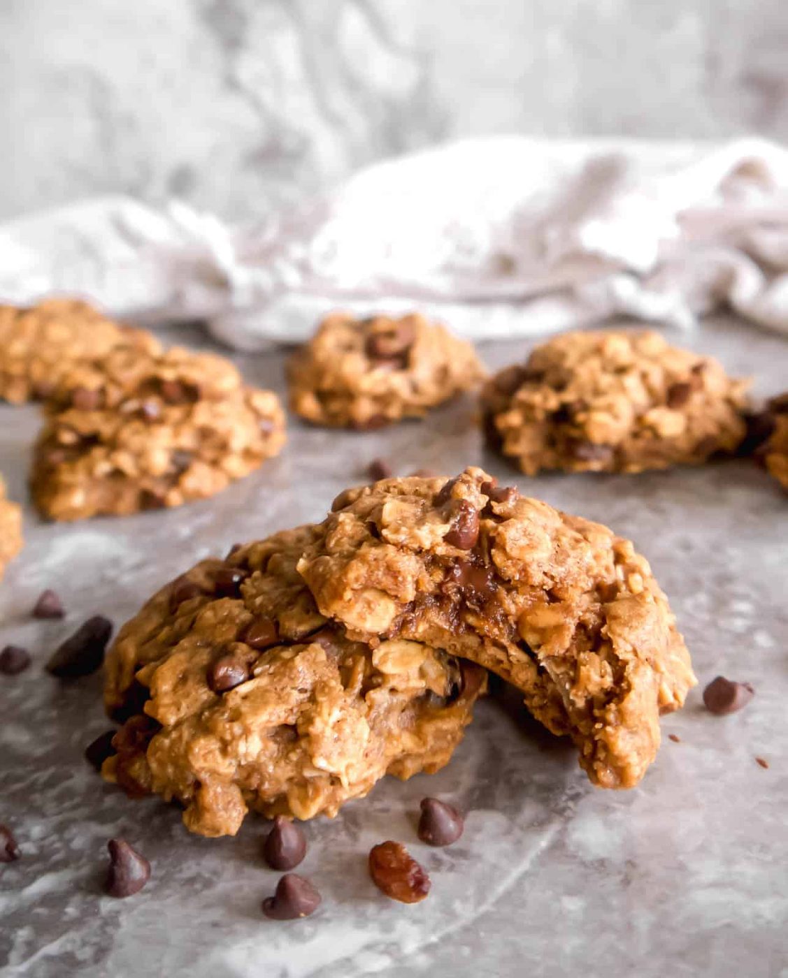 Dairy free lactation cookies stacked on top of each other with a bite taken out.