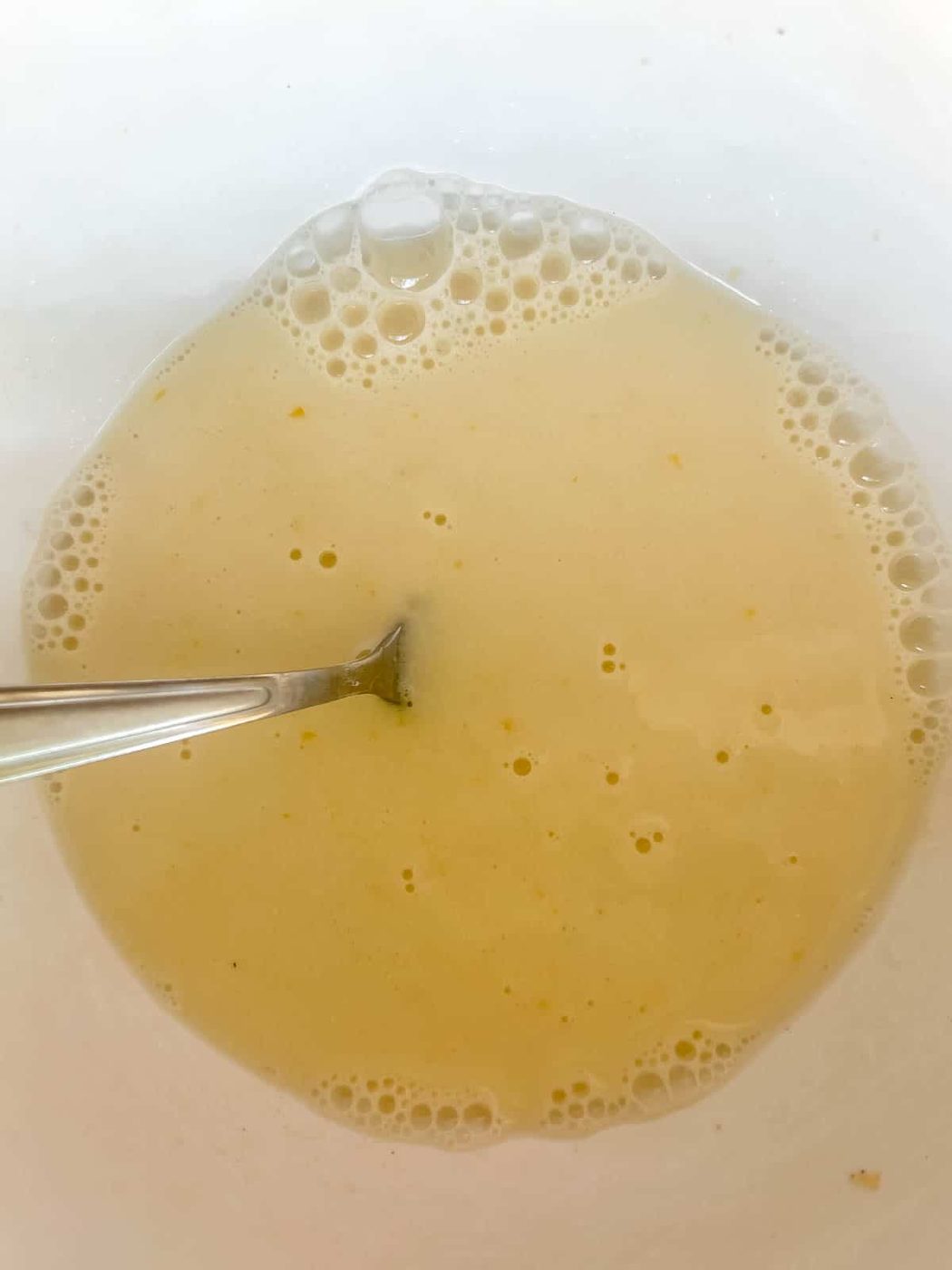 The paleo pancake wet ingredients in a bowl.