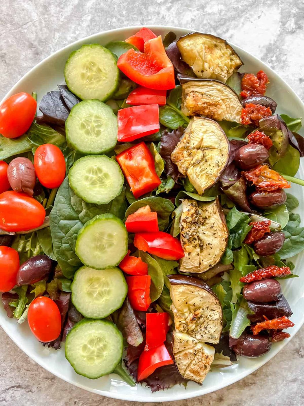Olives and sundried tomatoes added to the salad.