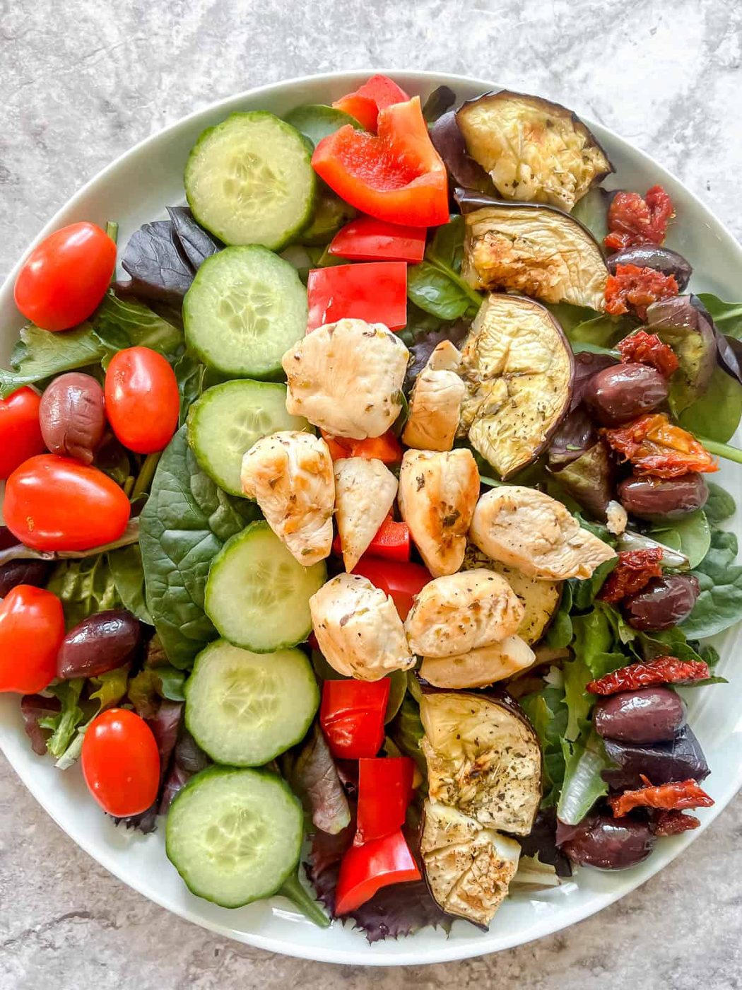Chicken added to the salad.